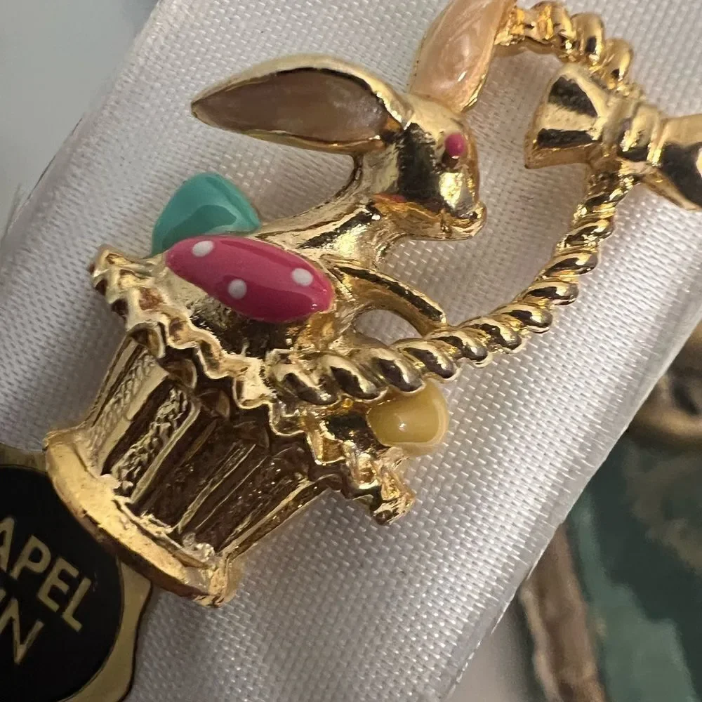 Gold tone Easter Bunny in Basket vintage lapel pin.